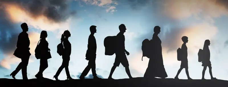 A minimalist conceptual graphic depicting the stark silhouette of figures migrating across a brightly backlit golden horizon line. The imagery serves as a powerful visual representation of youth migration, displacement, and socioeconomic journeys.