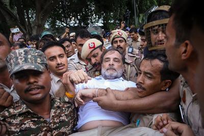 Rahul Rajiv Gandhi  an Indian politician and Leader of the Opposition in the Lok Sabha beign detained by delhi police.