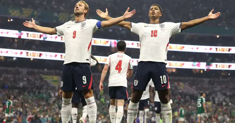 Harry kane and Jude Bellingham celebrating after win
